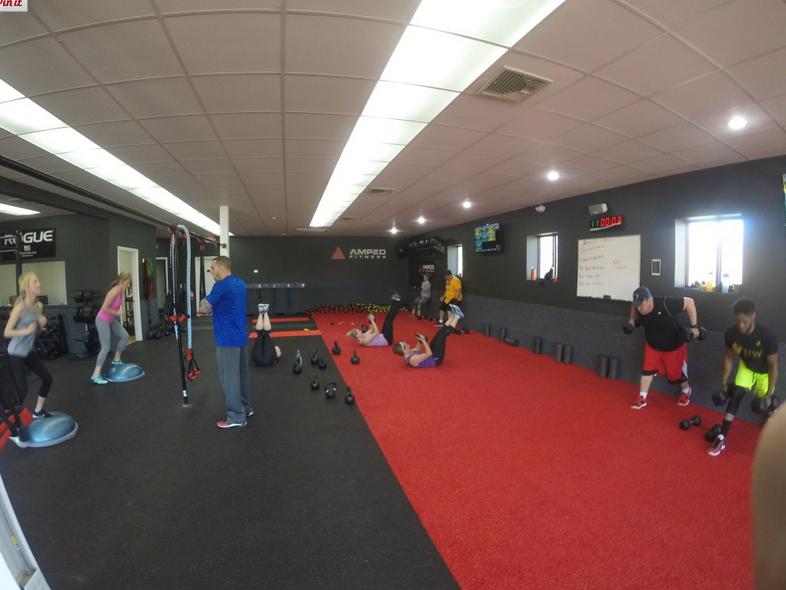 Amped Fitness Training Facility showing a work out session