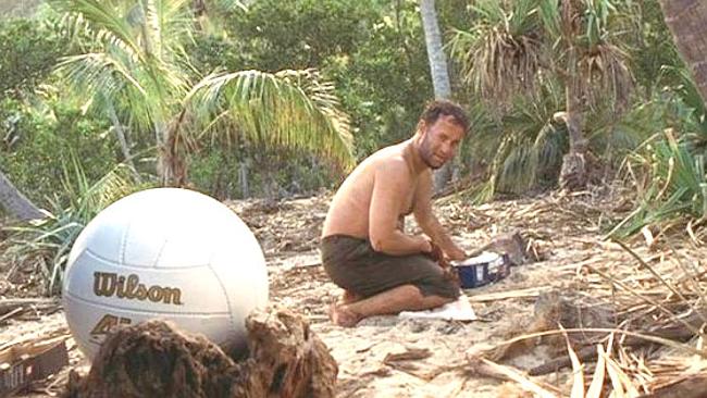 Tom Hanks In Castaway looking at his soccer ball friend named Wilson