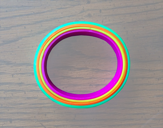 overhead view of custom rubber wristband sizes