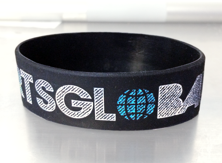 hearts global bracelet for charity in black produced by wristband bros