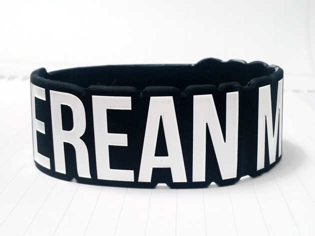 amazing wristband made for berean music die cut in black with white ink