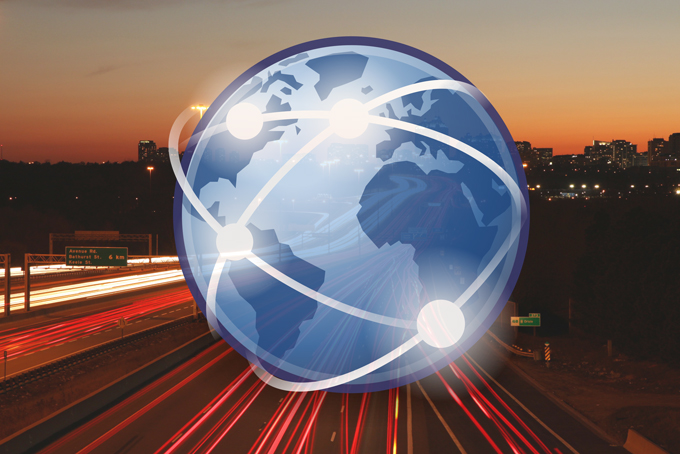 internet globe logo on top of highway