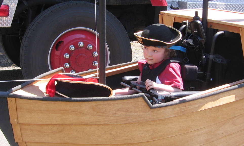 Keaton rides his Magic Wheelchair pirate ship with full swashbuckling gear
