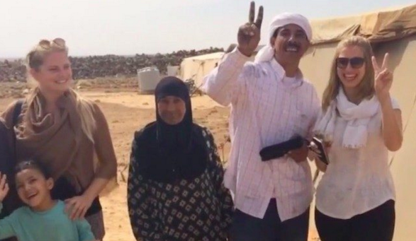 The Syrian Fund at work in Jordan showing people making peace sign