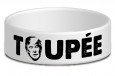trump toupee wristband with trump face as O in toupee