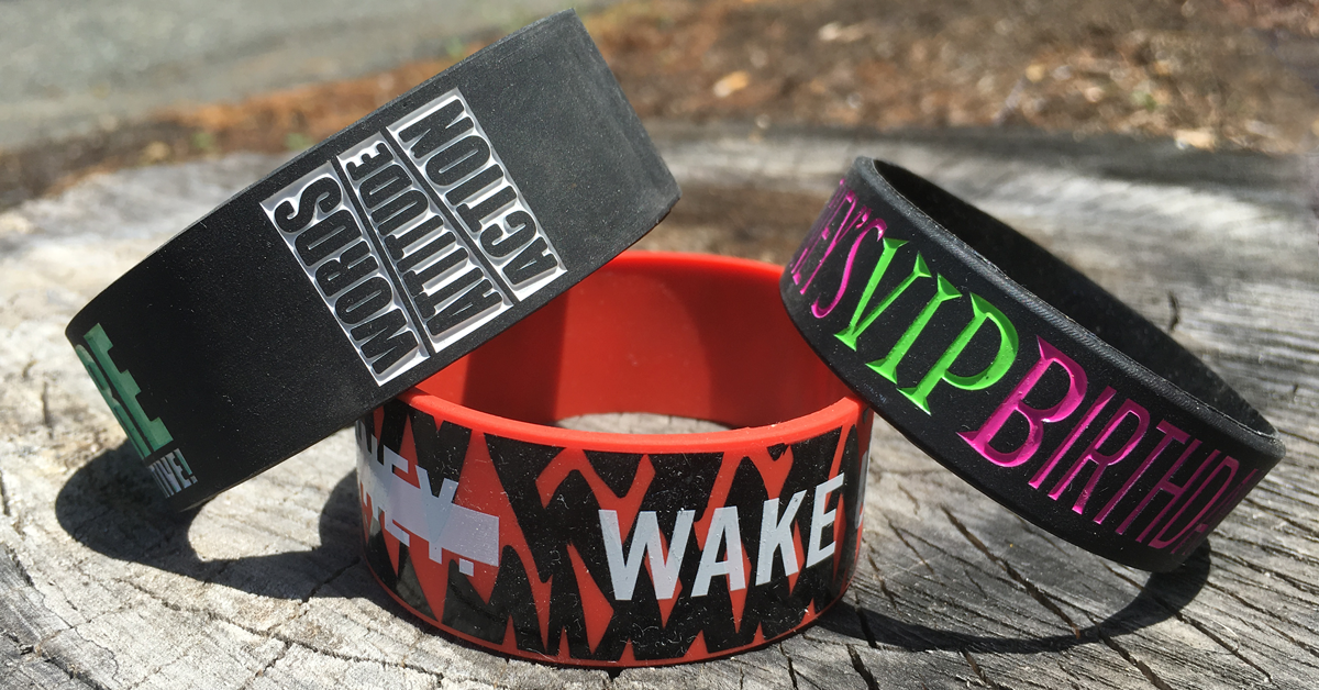 wristband maker number 2 image of bands on tree stump