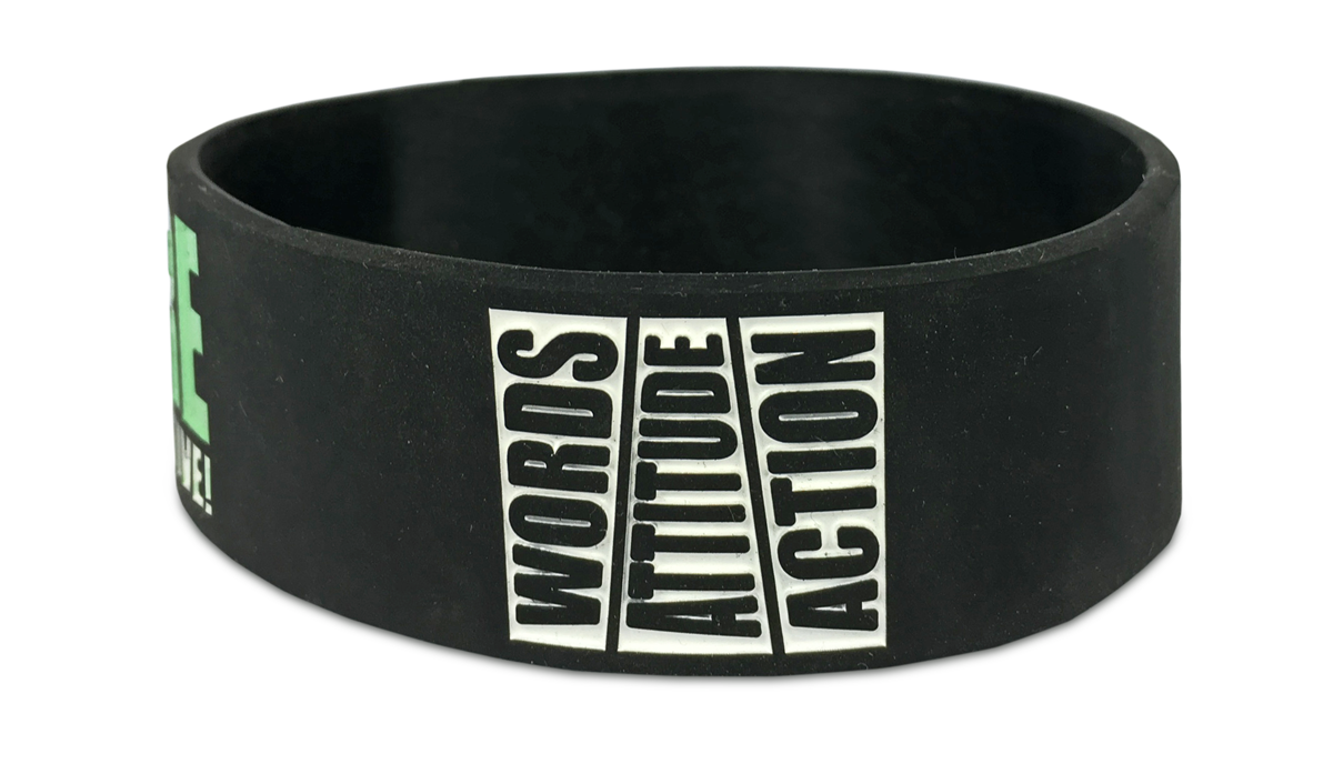 vertical text wristband that says words, attitude and action