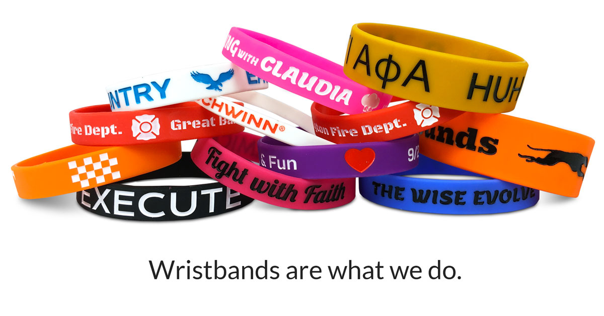 pic of custom silicone wristbands piled on top of one another