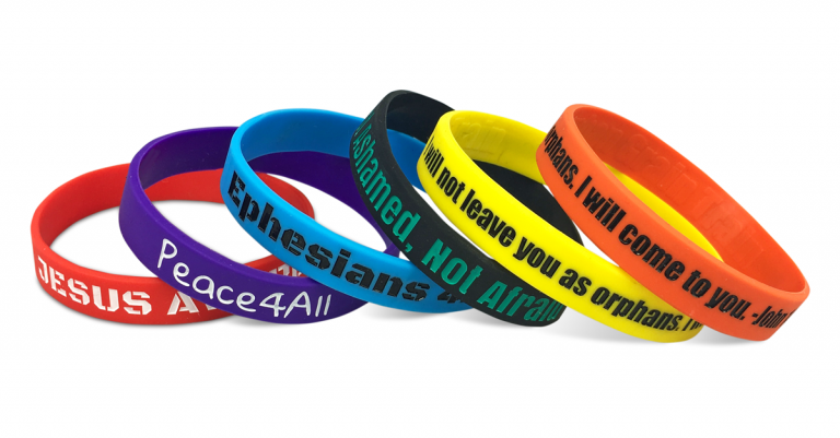 faith wristbands on white background