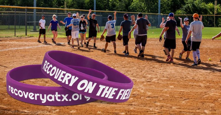 recovery atx wristbands on softball field