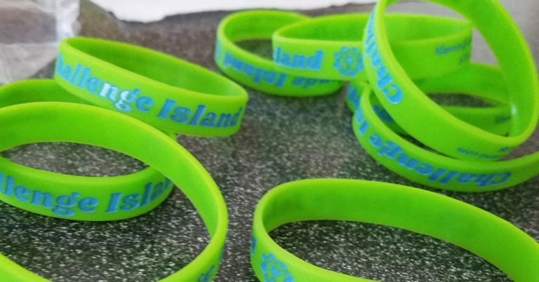 wristbands for challenge island on table