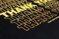 close up of screen printed tote bag in black